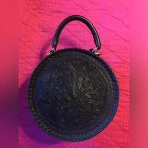 Juan Antonio black tooled leather/snakeskin round handbag
